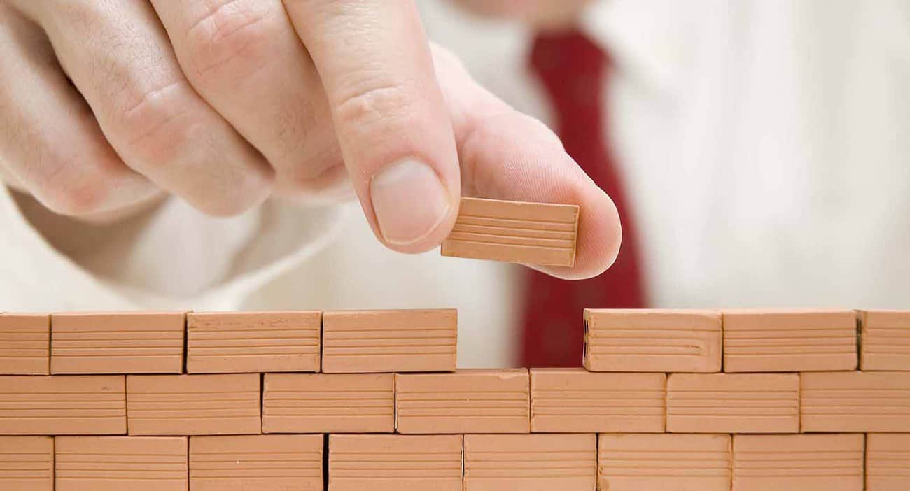 What Can a Party Wall Delay Actually Cost a Project Woking?